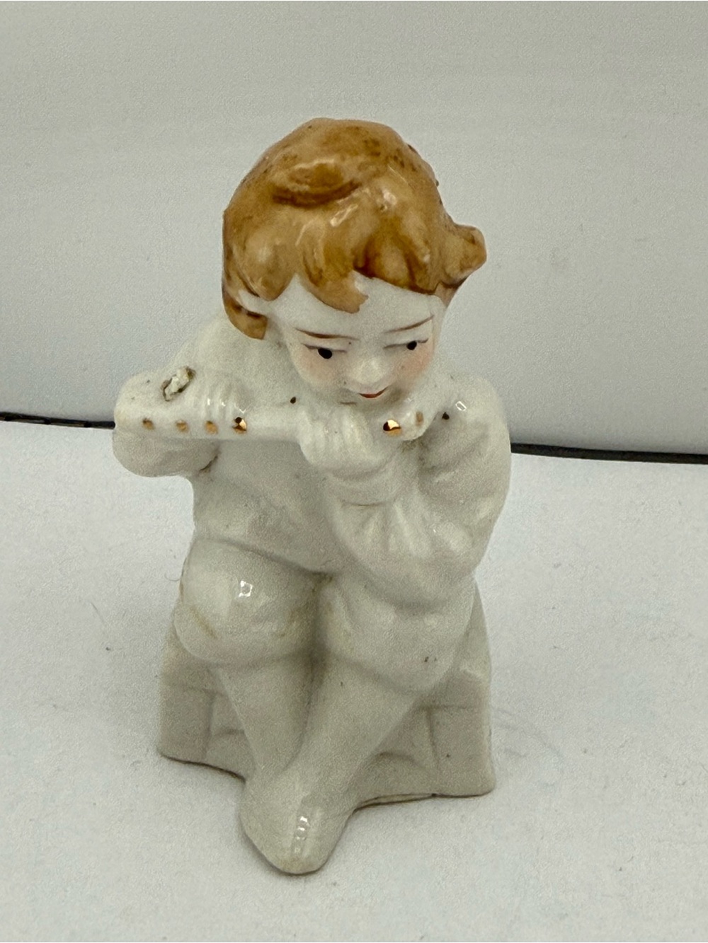 Vintage Porcelain Boy Figurine with Flute - White and Light Brown